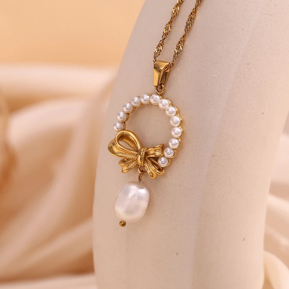 Elegant Pearl Bow Pendant Set